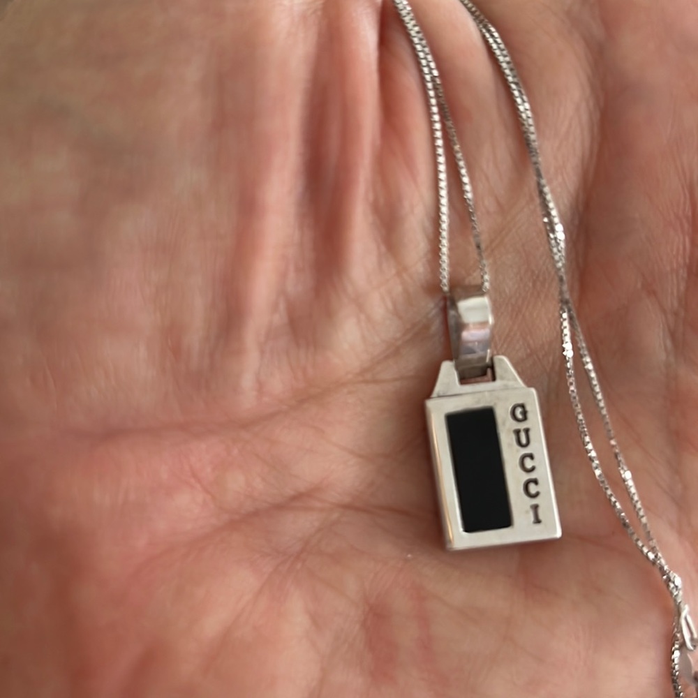 Genuine Gucci,18 k white Gold chain and pendant